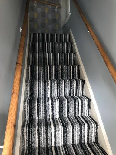 Balck and white striped stair carpet with free underlay